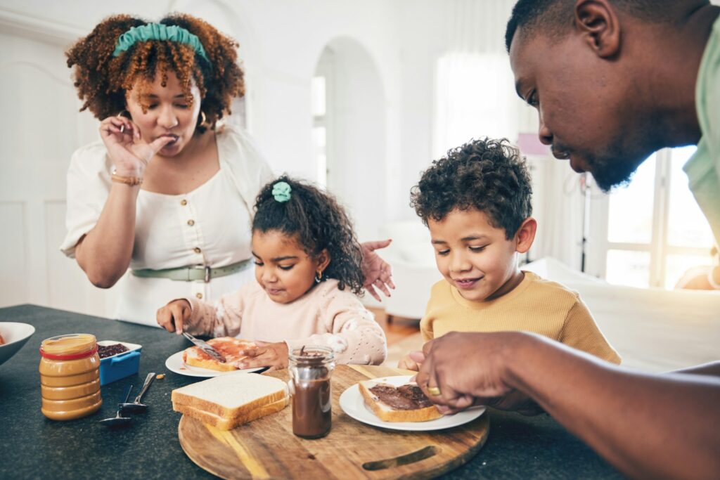 Love, black family and breakfast for nutrition, quality time and wellness in kitchen, happiness and